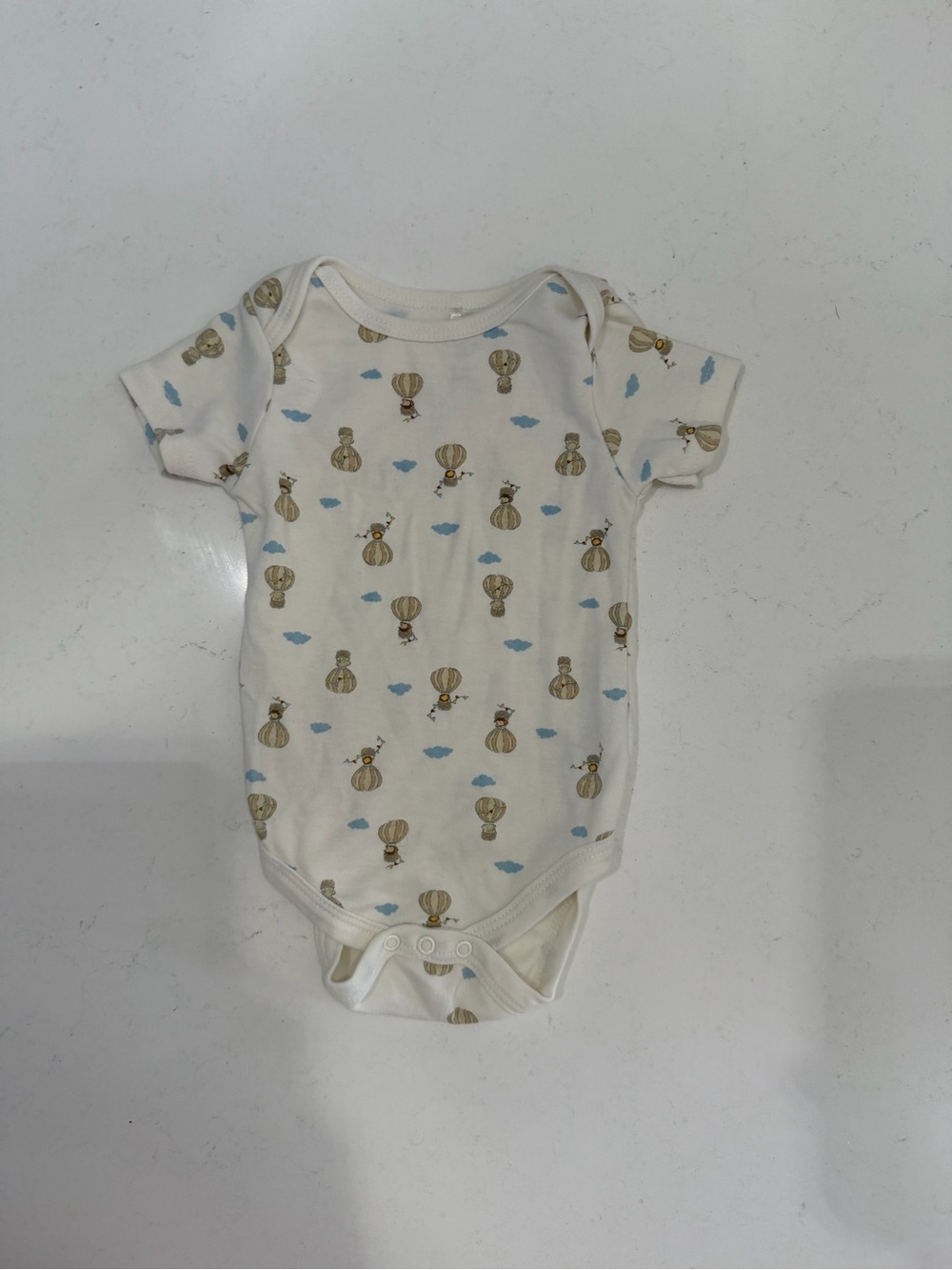OP Cream One-Piece Bodysuit with Blue Cloud and Tan Hot Air Balloon Print